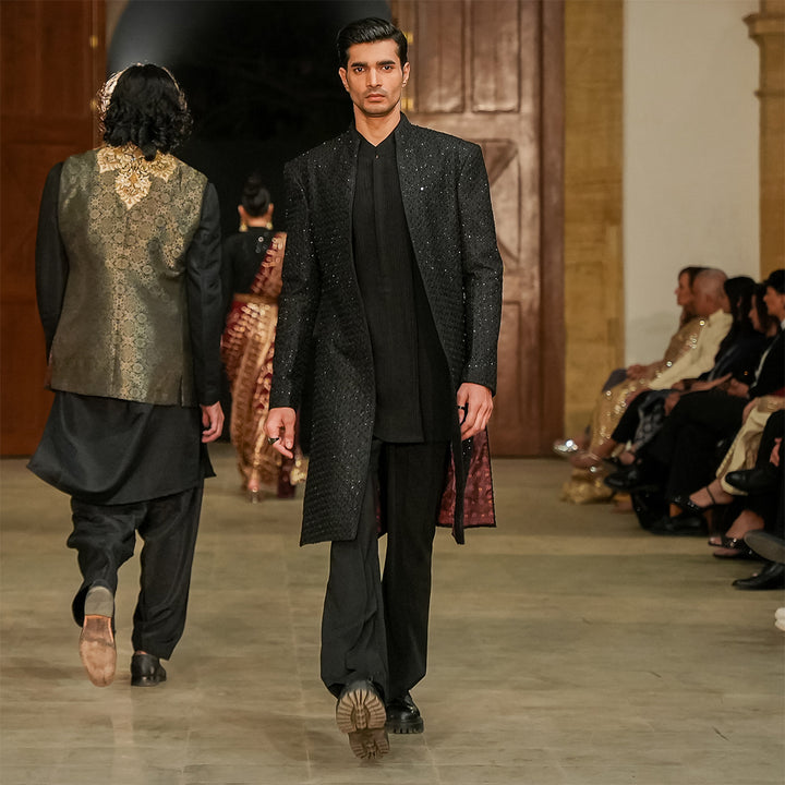 Black open-front sherwani in raw silk with cut-dana work