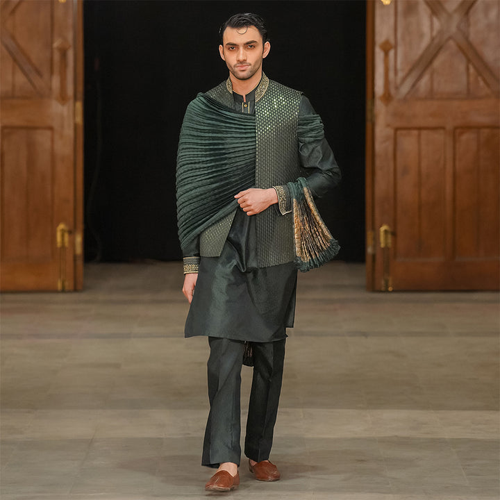 Green satin embroidered leaf-design waistcoat paired with jamawar kurta