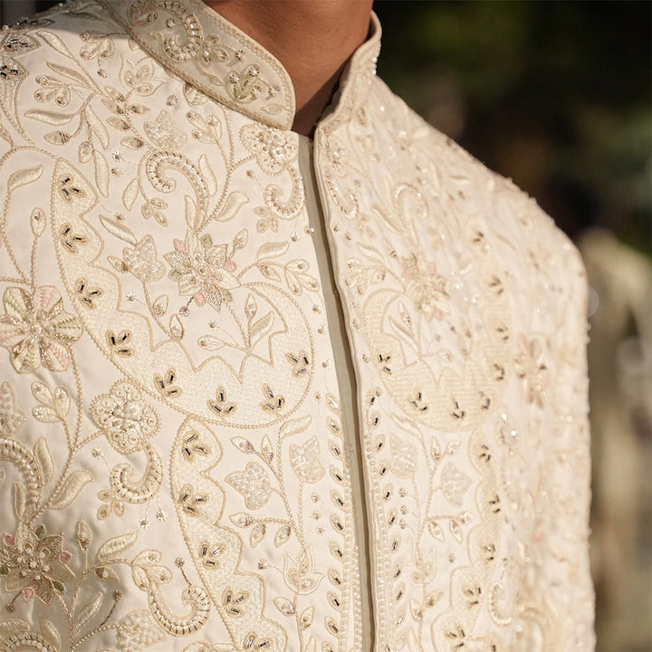 Off-white satin sherwani with cut-dana hand embroidery